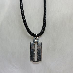 Tiny razor blade necklace